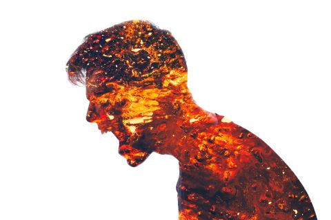 Outline of an angry man with flames inside the outline to illustrate the article 