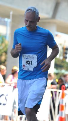 <p>Mike pushes&nbsp;through the wall.</p>